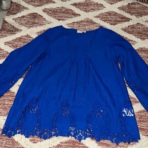 Brand new blue long sleeve shirt.